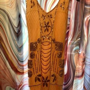 Cream colored beaded flapper dress